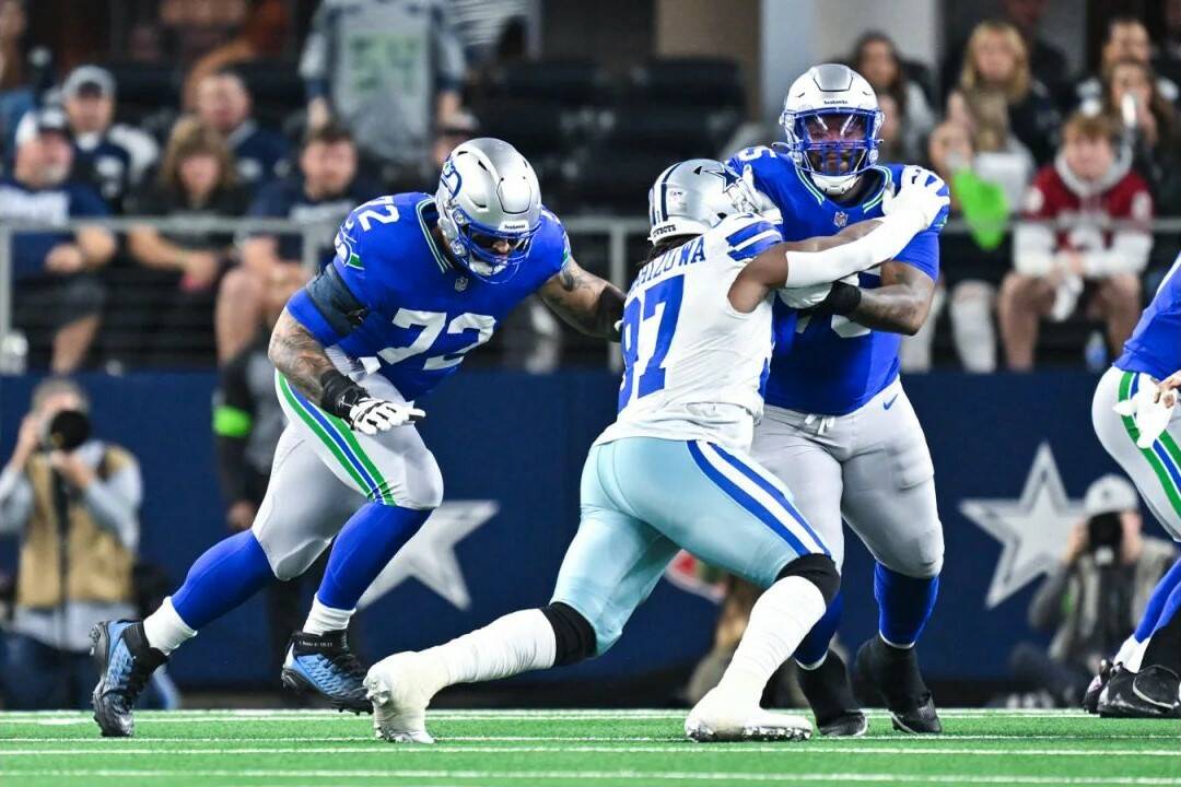 Seahawks offensive lineman Abe Lucas, an Archbishop Murphy High School graduate, prepares to block against the Dallas Cowboys at AT&T Stadium on Nov. 30, 2023. (Photo courtesy of the Seattle Seahawks).
