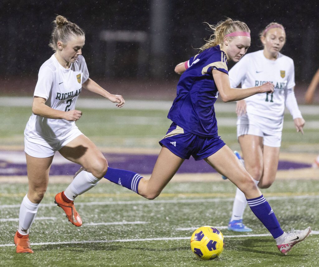 Lake Stevens’ Olivia Fast cuts off a pass during the 4A state playoff game against Richland on Wednesday, Nov. 13, 2024 in Lake Stevens, Washington. (Olivia Vanni / The Herald)
