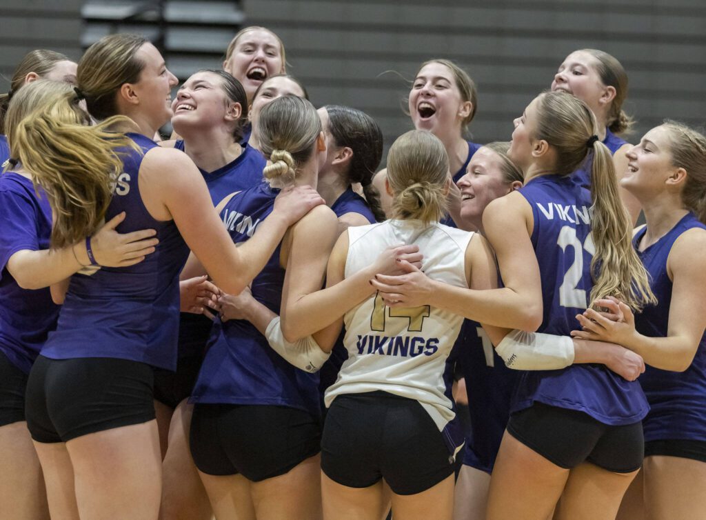 Lake Stevens players celebrate to beating Eastlake in the 4A district semifinal game to advance to the final on Thursday, Nov. 14, 2024 in Lynnwood, Washington. (Olivia Vanni / The Herald)

