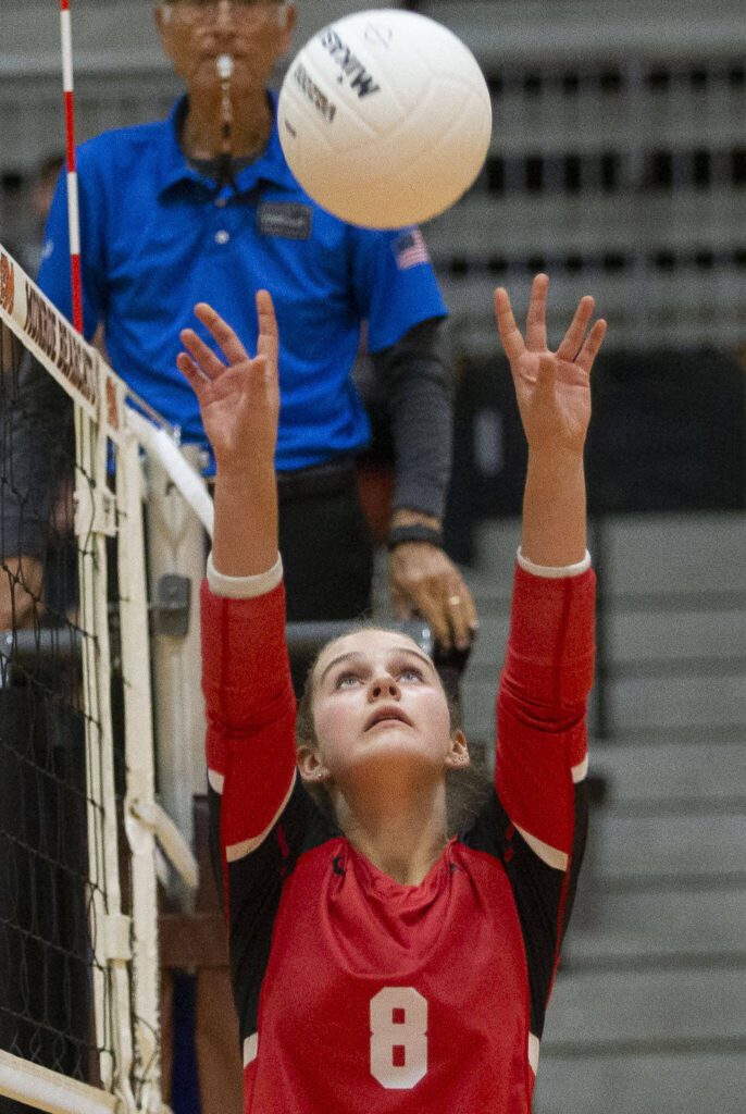 Snohomish’s Maggie Cavanaugh sets the ball during the game against Monroe on Wednesday, Oct. 16, 2024 in Monroe, Washington. (Olivia Vanni / The Herald)
