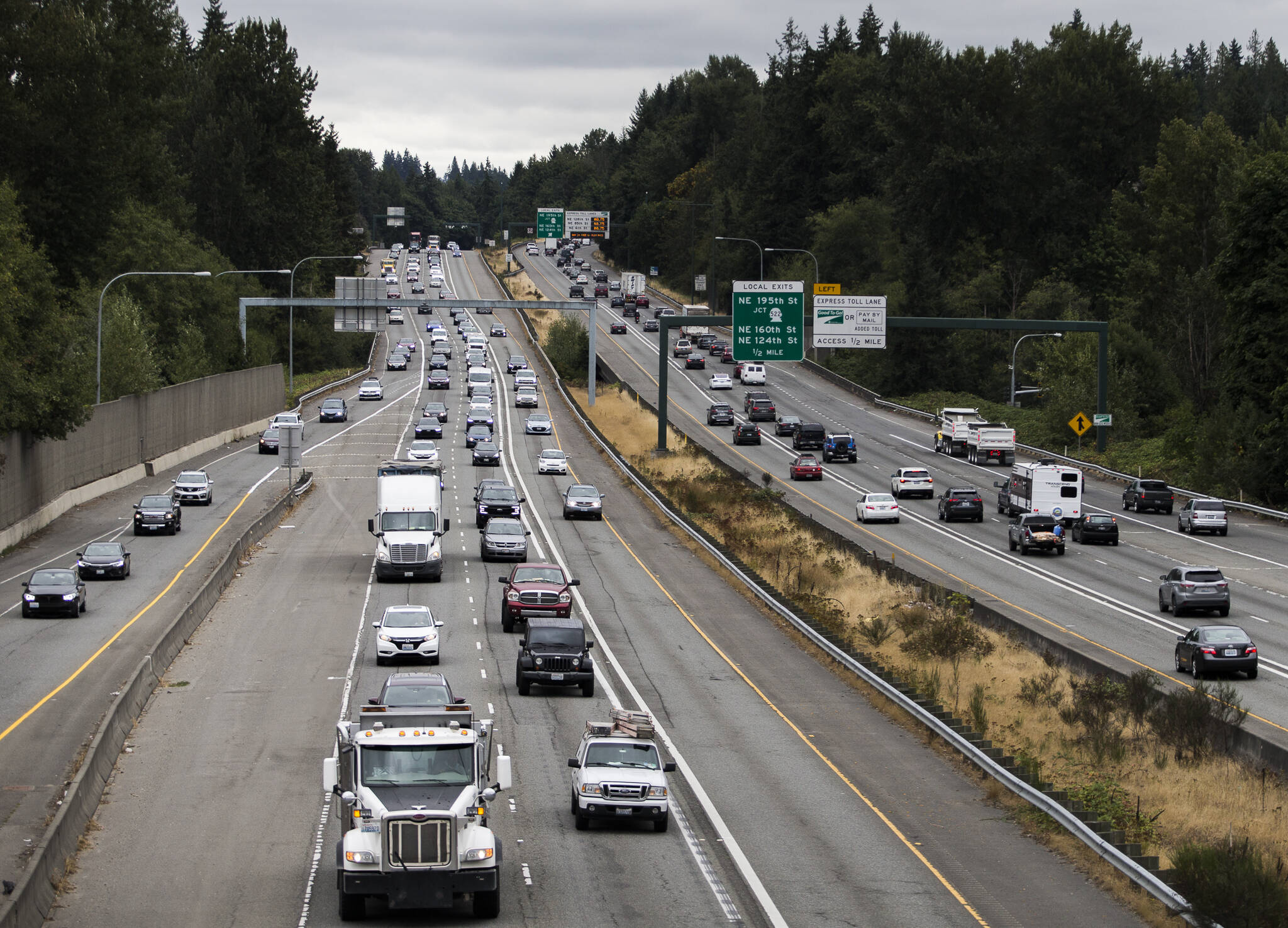 Traffic moves along I-405 between Highway 522 and Highway 527 where WSDOT received the approval to build a second express toll lane on Friday, Aug. 20, 2021 in Bothell. (Olivia Vanni / The Herald)