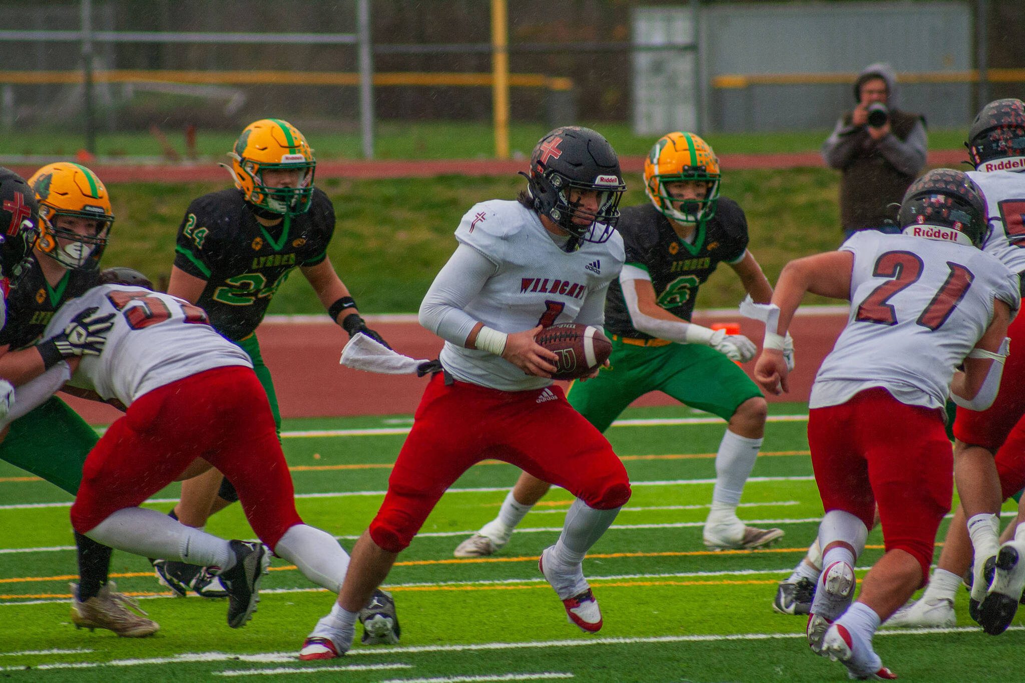 Archbishop Murphy quarterback AJ Bombach drops back on a run play against Lynden on Saturday, Nov. 23, 2024 in Ferndale, Wash. Archbishop Murphy defeated Lynden 10-9 to advance to the semi-finals in the 2A state tournament. (Photo courtesy of Zen Hill)