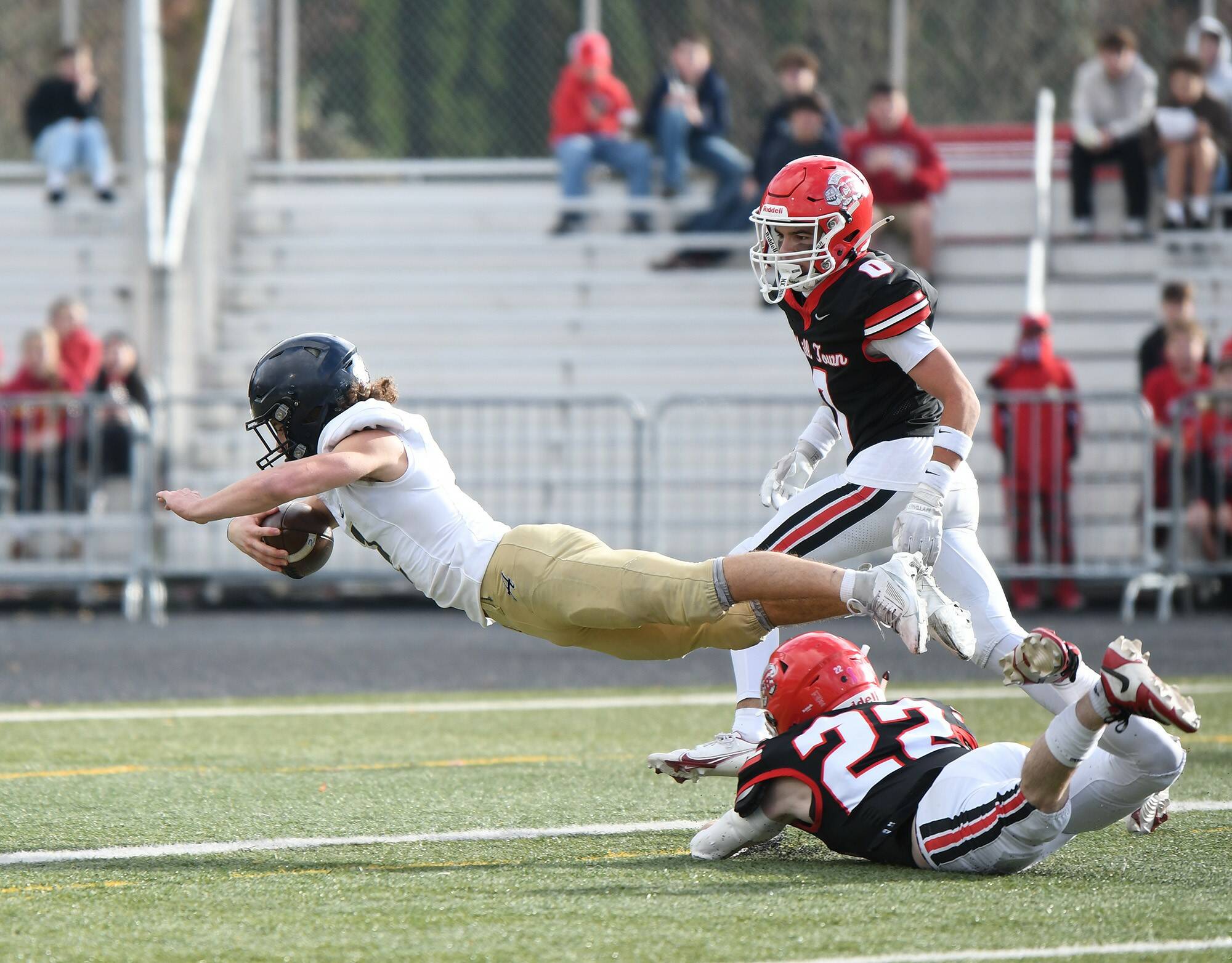 Arlington senior Chase Deberry dives into the end zone Saturday, Nov. 23, 2024, during the Eagles’ 35-21 loss to Camas in a quarterfinal playoff game at Doc Harris Stadium in Camas. (Taylor Balkom / The Columbian)