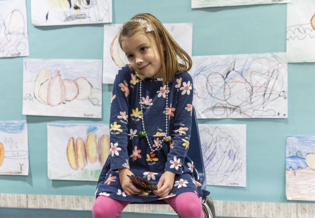 Highland Elementary kindergartener Blake Coleman, 5, shrugs when she is asked if she knows when the first Thanksgiving was on Tuesday, Nov. 26, 2024 in Lake Stevens, Washington. (Olivia Vanni / The Herald)
