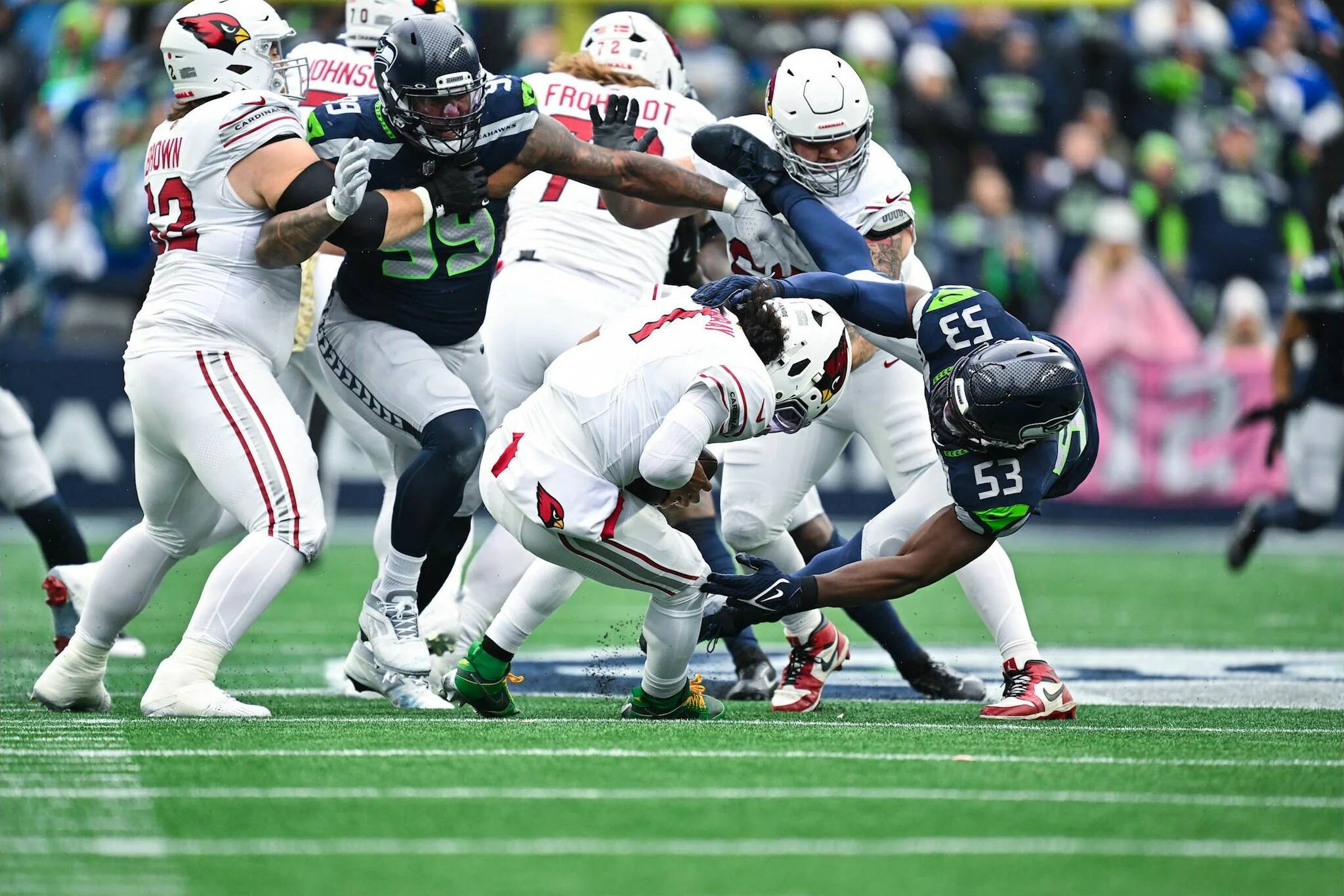 Seahawks’ linebacker Boye Mafe (53) sacks Arizona Cardinals quarterback Kyler Murray (1) as defensive end Leonard Williams (99) collapses the pocket during Seattle’s 16-6 win at Lumen Field on Sunday, Nov. 24, 2024. (Photo courtesy of the Seattle Seahawks)