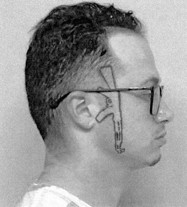 Lane Scott Phipps depicted with an AK-47 tattoo going down the side of his face. (Snohomish County Superior Court)