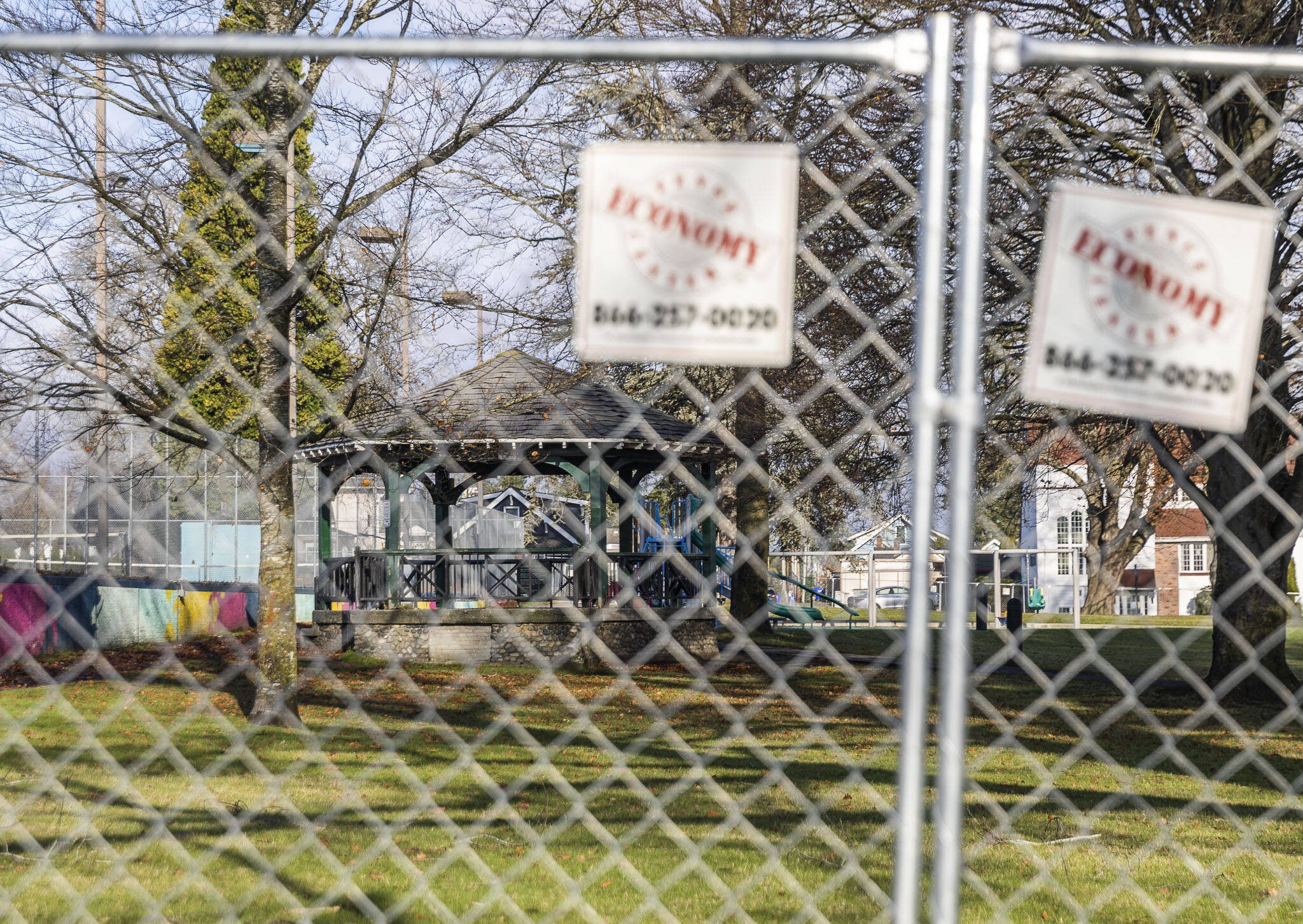 A chain link fence surrounds Clark Park on Friday, Nov. 29, 2024 in Everett, Washington. (Olivia Vanni / The Herald)