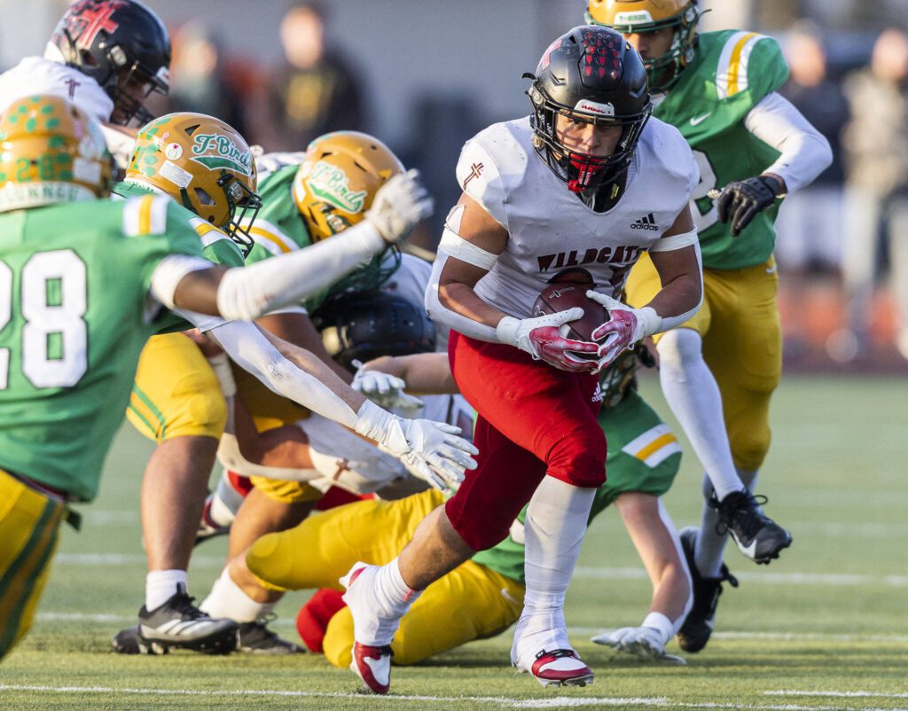 Archbishop Murphy’s Jevin Madison escapes multiple tackles while running the ball during the 2A semifinal game against Tumwater on Saturday, Nov. 30, 2024 in Tumwater, Washington. (Olivia Vanni / The Herald)
