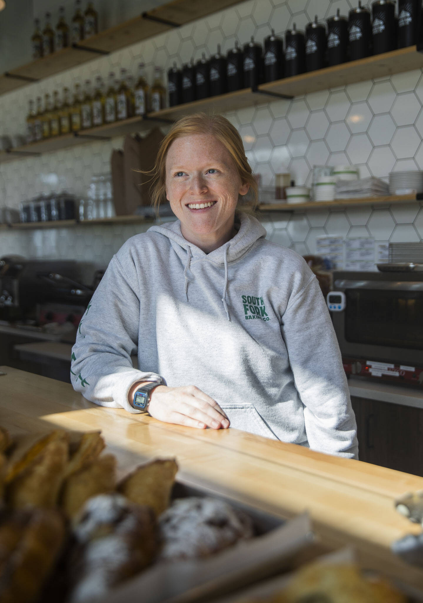 South Fork Baking Company owner Katherine Hillman in her bakery on Wednesday, Oct. 2, 2024 in Everett, Washington. (Olivia Vanni / The Herald)