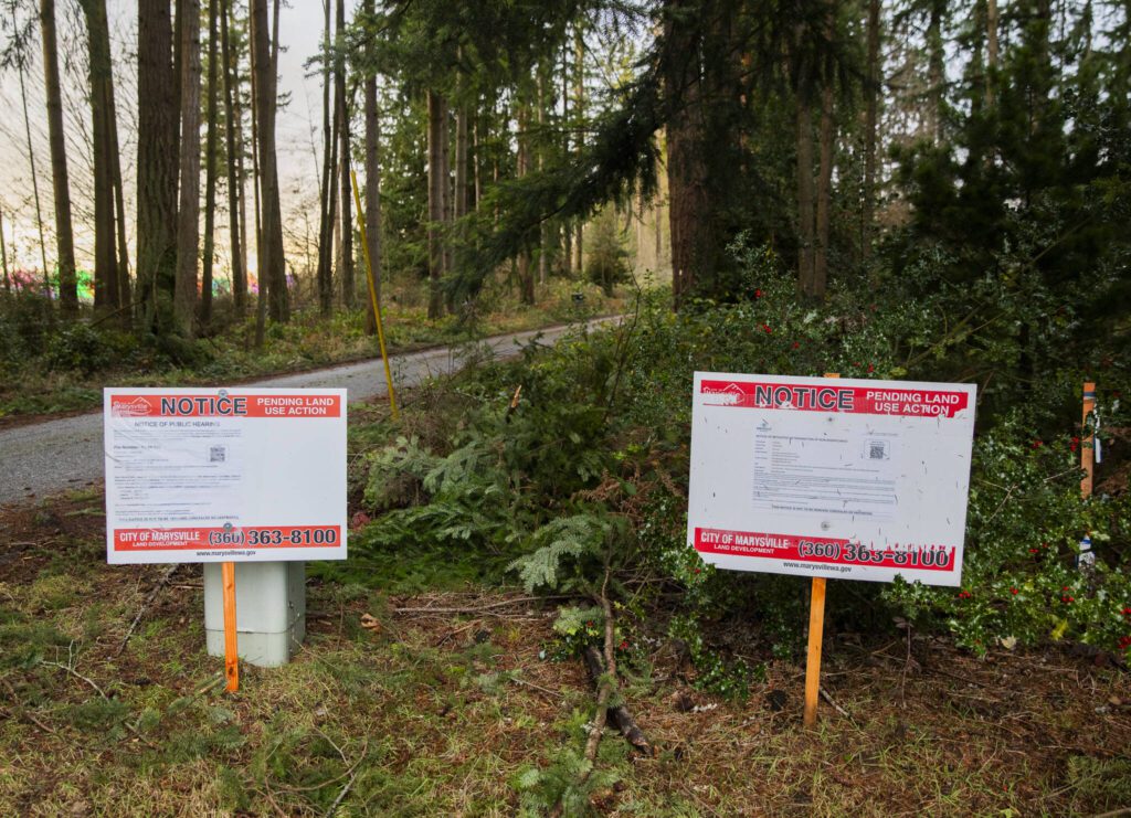 Pending land use action signs off of 35th Avenue on Friday, Dec. 20, 2024 in Marysville, Washington. (Olivia Vanni / The Herald)
