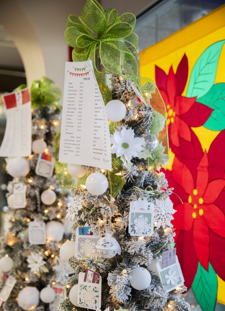 One of two gift card raffle trees on display at the Assistance League of Everett’s Thrift Store on Monday, Dec. 2, 2024 in Everett, Washington. The drawing for the raffle is Dec. 15. (Olivia Vanni / The Herald)
