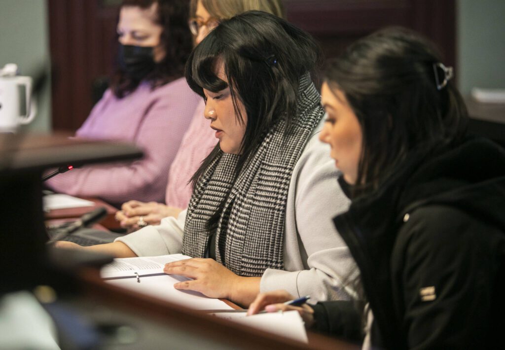 Everett City Finance Director Heide Brillantes goes through slides expanding upon some of the questions posed about the 2025 budget on Wednesday, Dec. 4, 2024 in Everett, Washington. (Olivia Vanni / The Herald)
