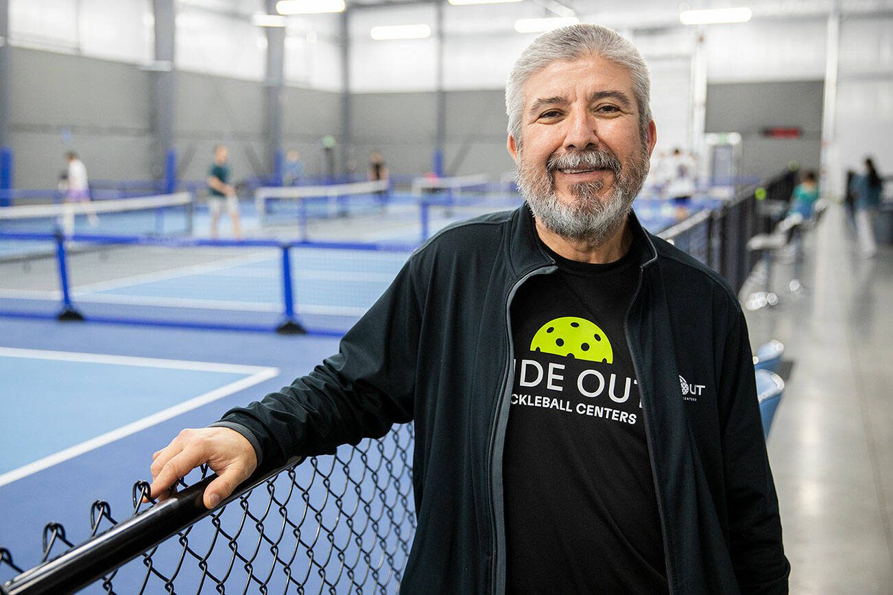 Side Out Pickleball Centers co-owner Frank Espinoza inside the newly opened facility in south Everett on Wednesday, Dec. 18, 2024. (Olivia Vanni / The Herald)