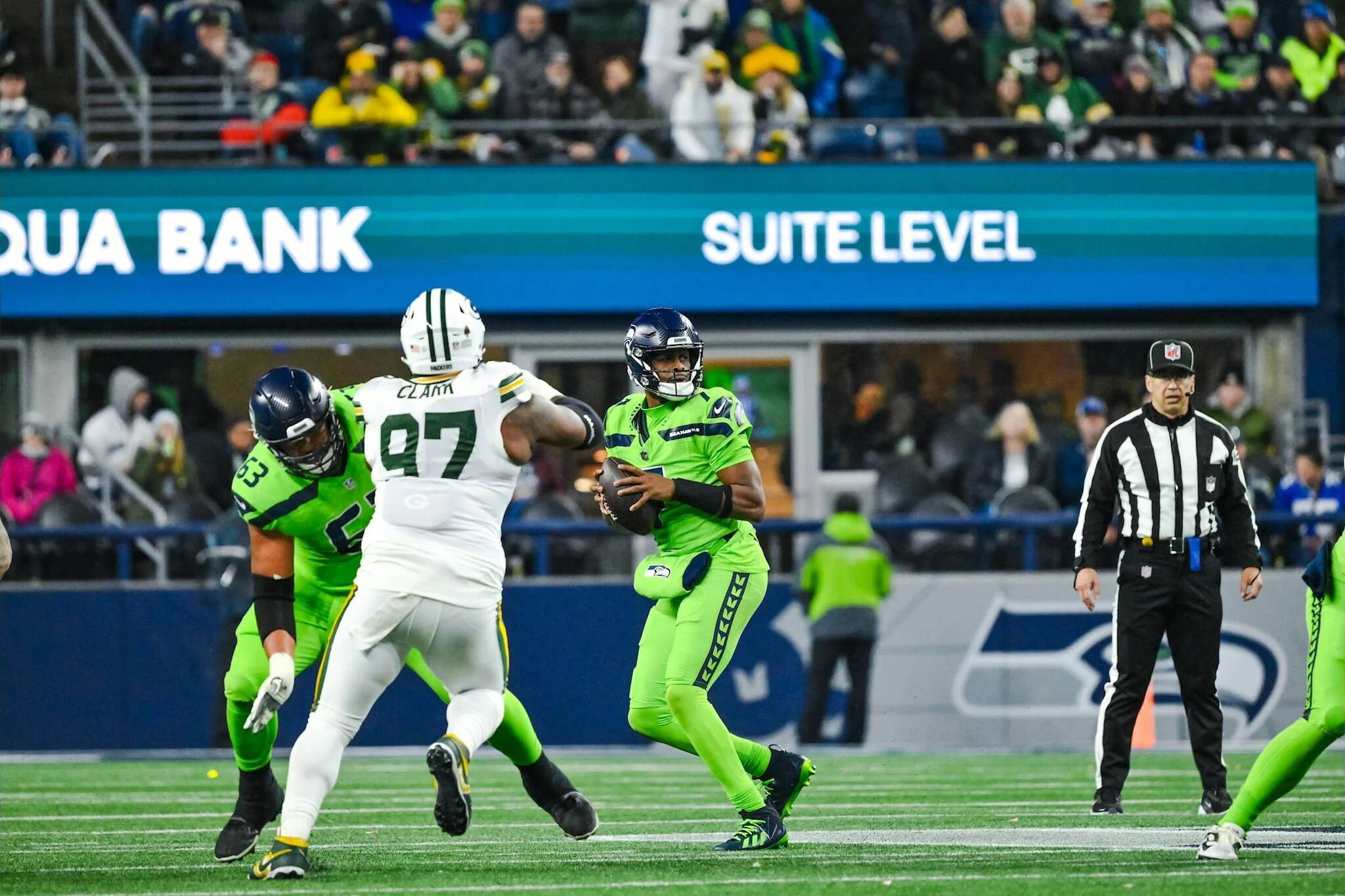 Seahawks quarterback Geno Smith looks for a receiver against the Green Bay Packers at Lumen Field on Sunday, Dec. 15, 2024. (Photo courtesy of Edwin Hooper / Seattle Seahawks)