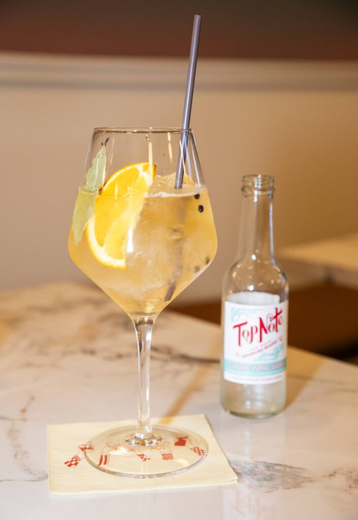 A wine spritz available at Marcel on Dec. 19 in Everett. (Olivia Vanni / The Herald)
