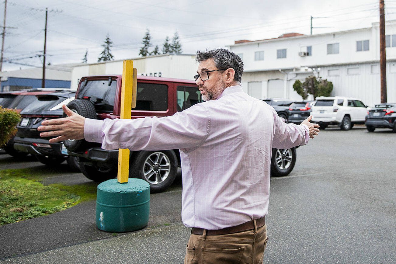 Jeremy Reed talks about the parking that could be lost to the proposed stadium site on Monday, Dec. 30, 2024 in Everett, Washington. (Olivia Vanni / The Herald)