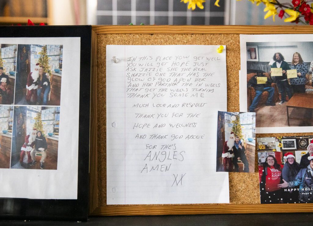Photographs and notes of thanks sit on display along the bar inside Hope ’N Wellness on Thursday, Jan. 9, 2025 in Everett, Washington. (Olivia Vanni / The Herald)
