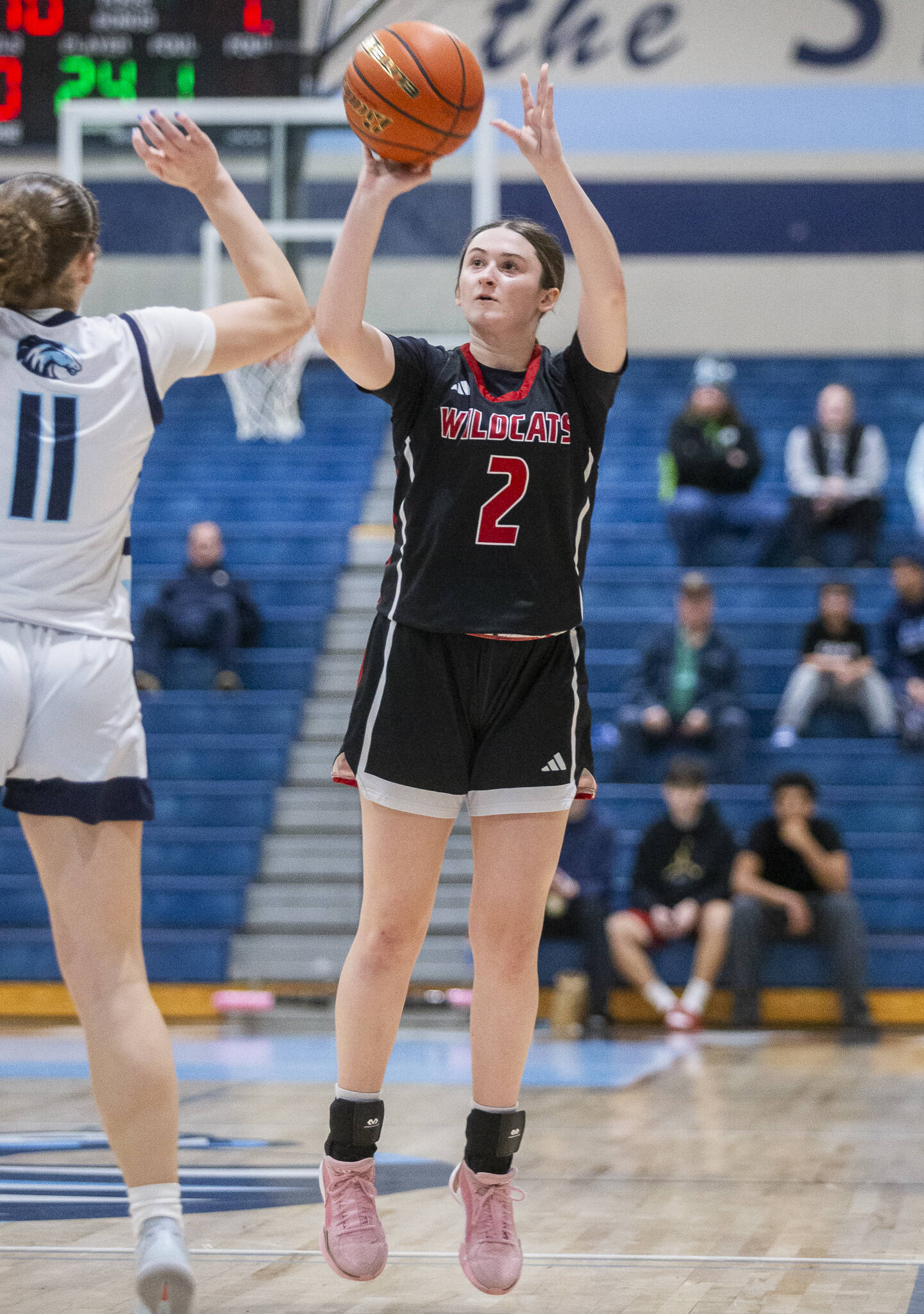 Archbishop Murphy’s Brooke Blachly makes a three point shot during the game against Meadowdale on Friday, Jan. 3, 2025 in Lynnwood, Washington. (Olivia Vanni / The Herald)