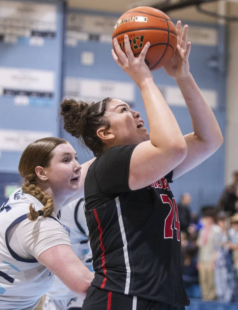 Archbishop Murphy’s Celine Wright makes a layup during the game against Meadowdale on Friday, Jan. 3, 2025 in Lynnwood, Washington. (Olivia Vanni / The Herald)
