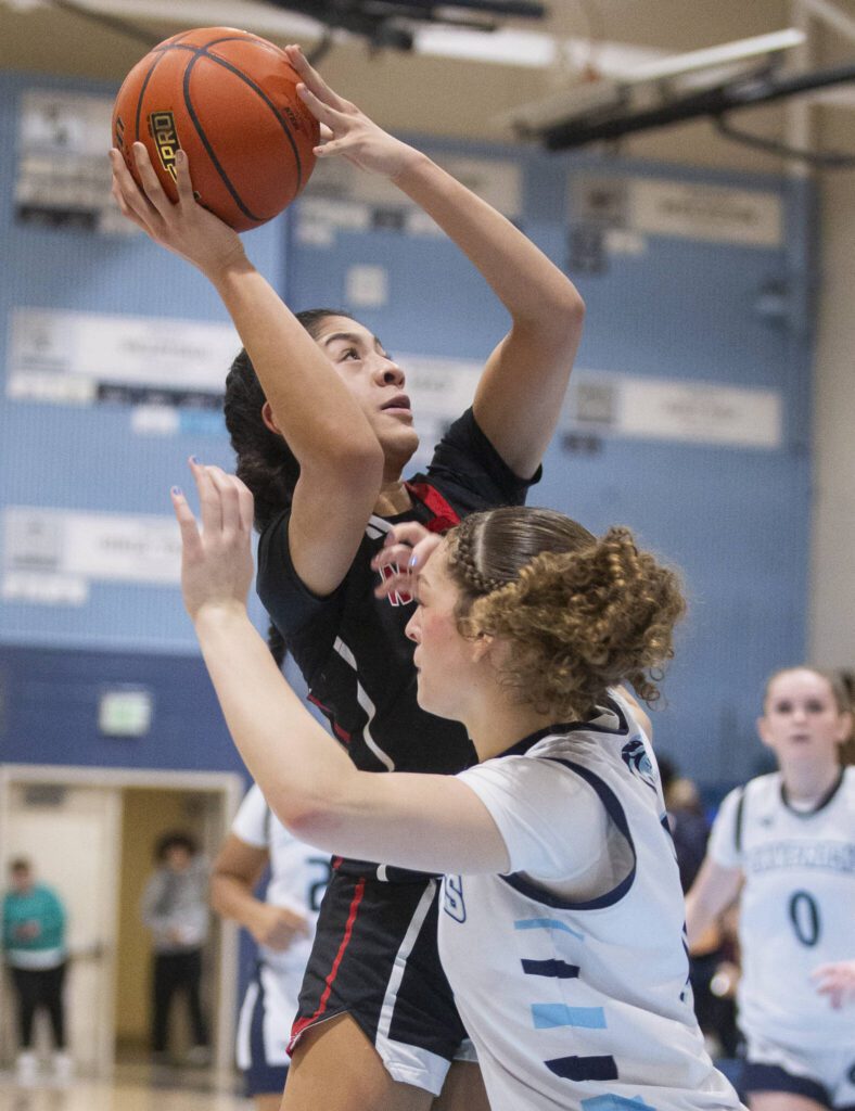 Archbishop Murphy’s Ashley Fletcher makes a layup during the game against Meadowdale on Friday, Jan. 3, 2025 in Lynnwood, Washington. (Olivia Vanni / The Herald)
