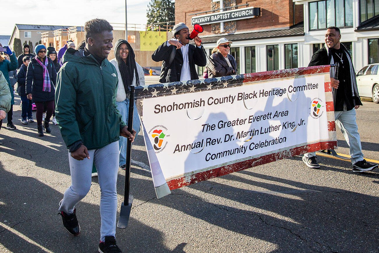 Noah Jackson helps lead those marching in song and chants during the Greater Everett Area’s Annual Martin Luther King Jr. Day march on Monday, Jan. 20, 2025 in Everett, Washington. (Olivia Vanni / The Herald)