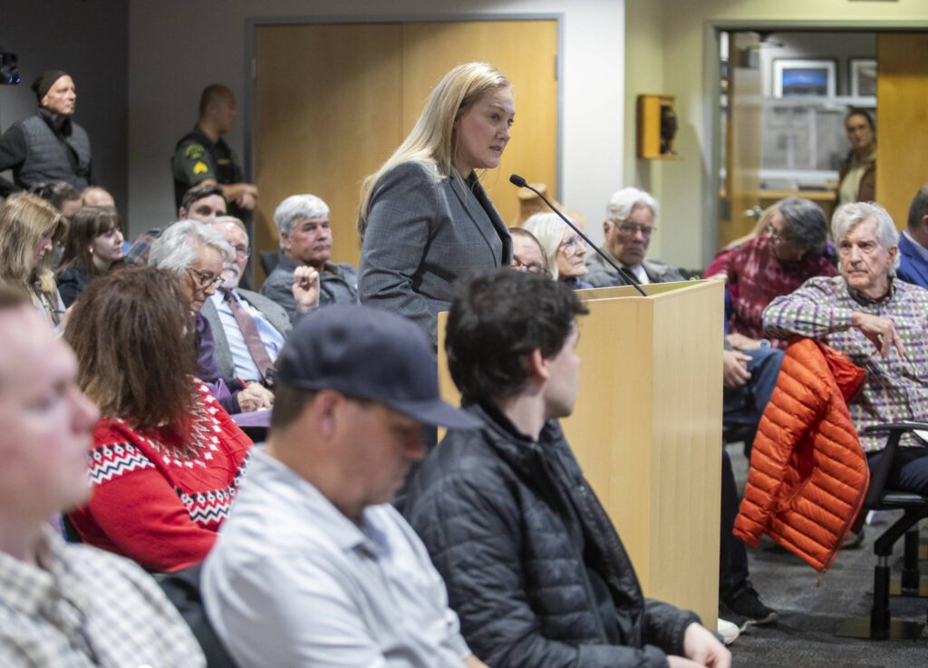 Natalie Reber, with the Master Builders Association, gives public comment to the Snohomish County Council about the proposed wetland ordinance amendments on Wednesday, Jan. 15, 2025 in Everett, Washington. (Olivia Vanni / The Herald)
