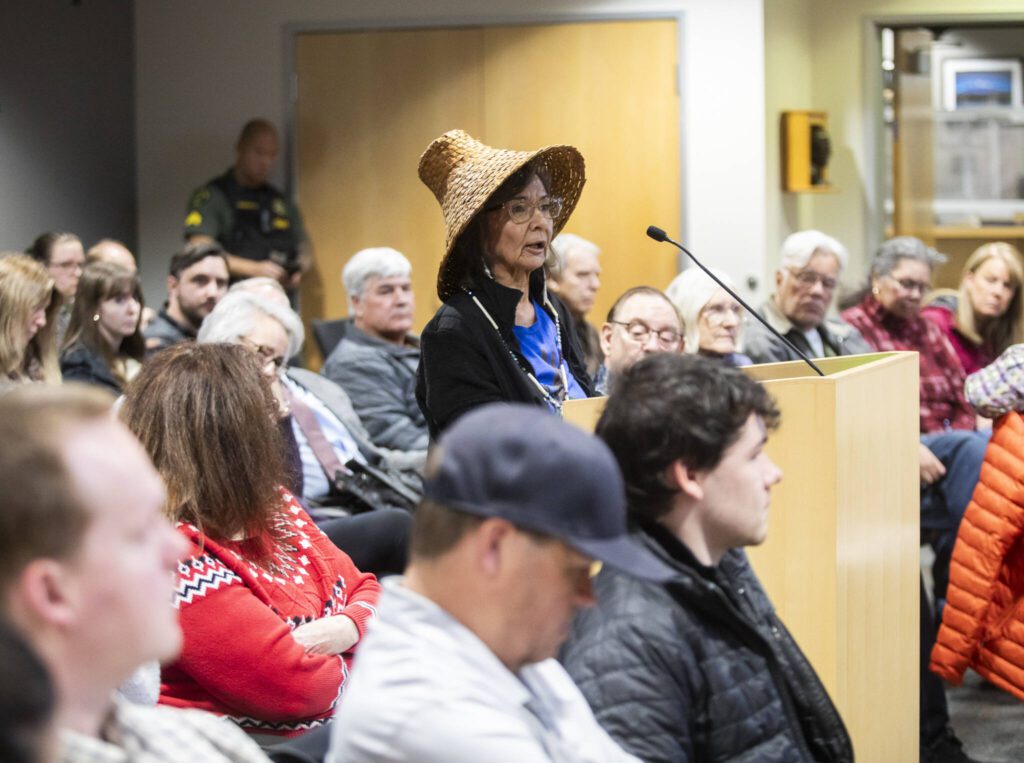 Chris Singleterry gives public comment to the Snohomish County Council about her disagreement with the proposed wetland ordinance amendments on Wednesday, Jan. 15, 2025 in Everett, Washington. (Olivia Vanni / The Herald)
