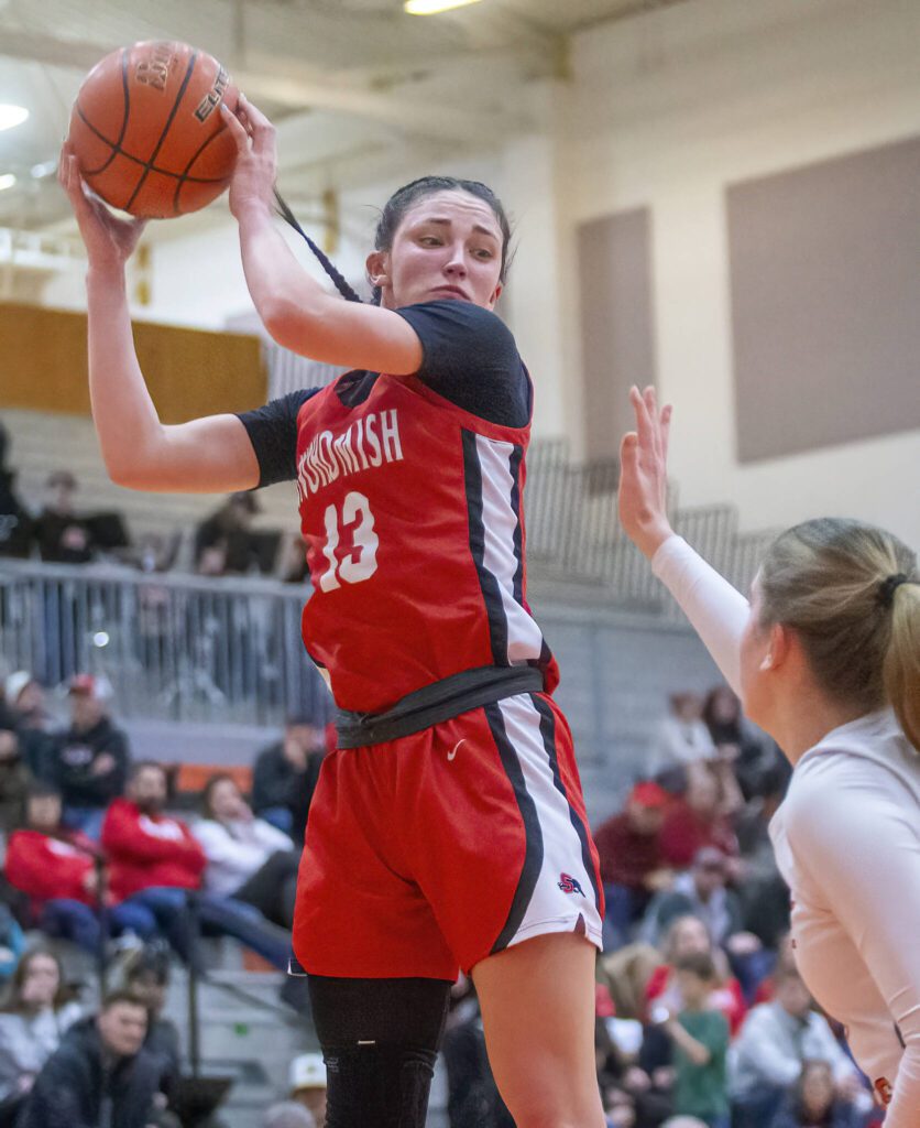 Snohomish’s Sienna Capelli leaps in the car to catch a high pass during the game Monroe on Wednesday, Jan. 15, 2025 in Monroe, Washington. (Olivia Vanni / The Herald)
