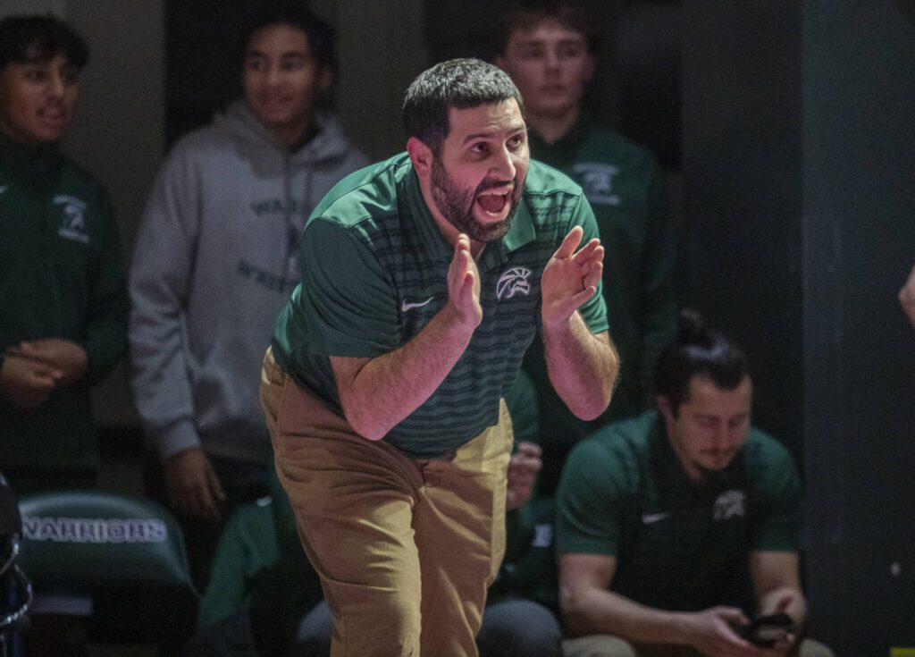 Edmonds-Woodway coach Brian Alfi calls out instructions during the match on Thursday, Jan. 16, 2025 in Edmonds, Washington. (Olivia Vanni / The Herald)
