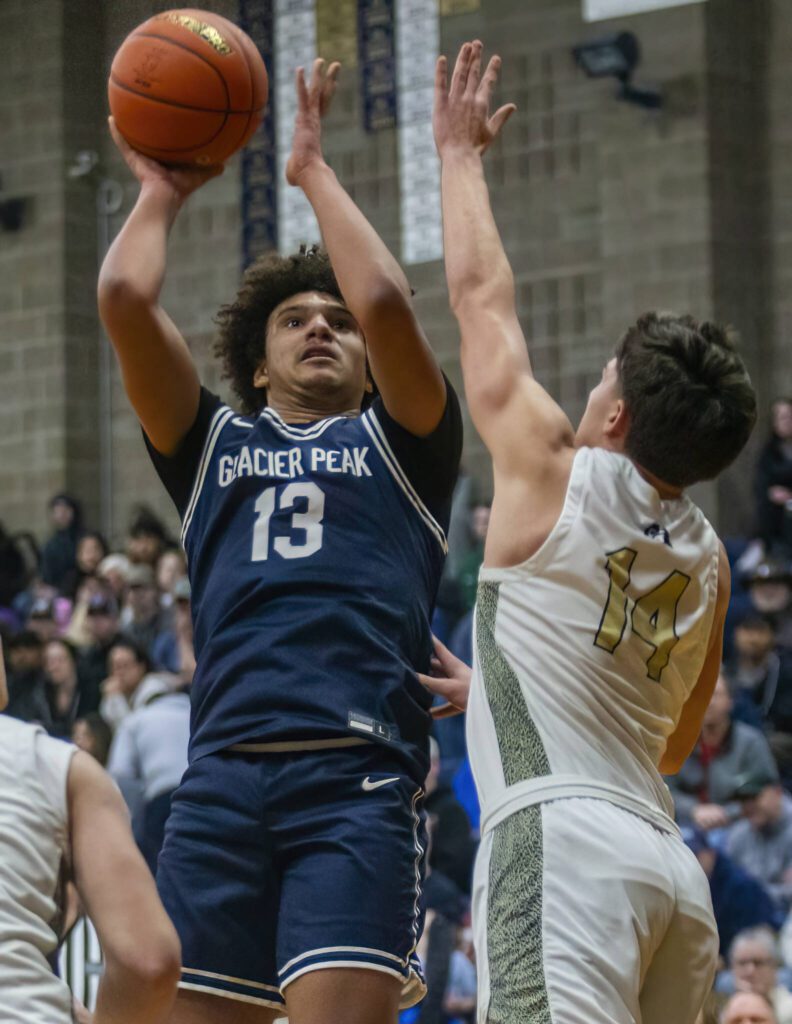 Glacier Peak’s Jayce Nelson makes a jump shot during the game against Arlington on Friday, Jan. 17, 2025 in Arlington, Washington. (Olivia Vanni / The Herald)

