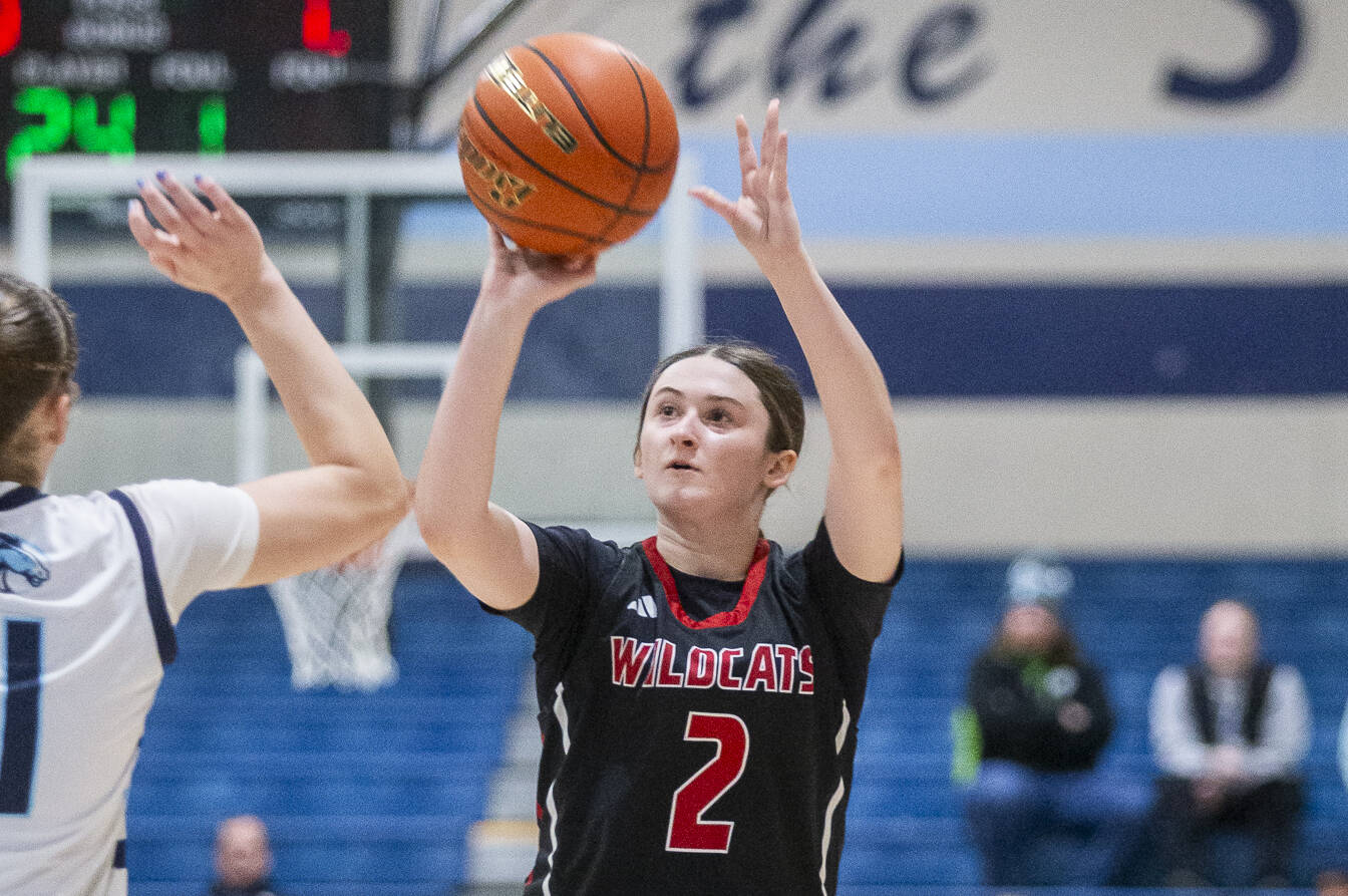 Archbishop Murphy’s Brooke Blachly makes a three point shot during the game against Meadowdale on Friday, Jan. 3, 2025 in Lynnwood, Washington. (Olivia Vanni / The Herald)