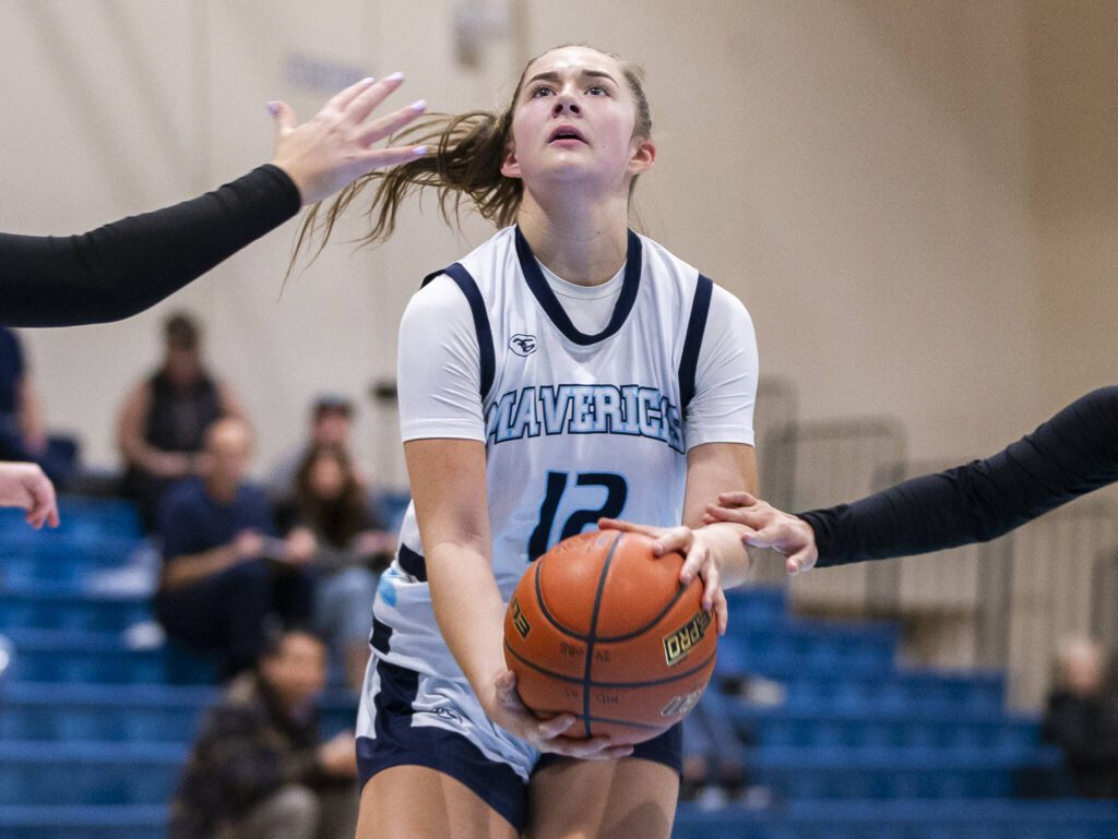 Meadowdale’s Lexi Zardis is fouled while trying to shoot during the game against Shorewood on Wednesday, Jan. 22, 2025 in Lynnwood, Washington. (Olivia Vanni / The Herald)

