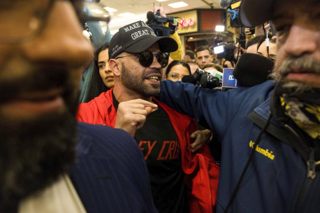 Enrique Tarrio, the Proud Boys leader who President Donald Trump offered reprieve from a 22-year prison sentence on Monday, arrives at Miami International Airport in Miami, on Jan. 22. Tarrio of the Proud Boys and Stewart Rhodes of the Oath Keepers asserted that they wanted President Trump to seek revenge on their behalf for being prosecuted in connection with the Jan. 6 riot. (Saul Martinez / The New York Times)
