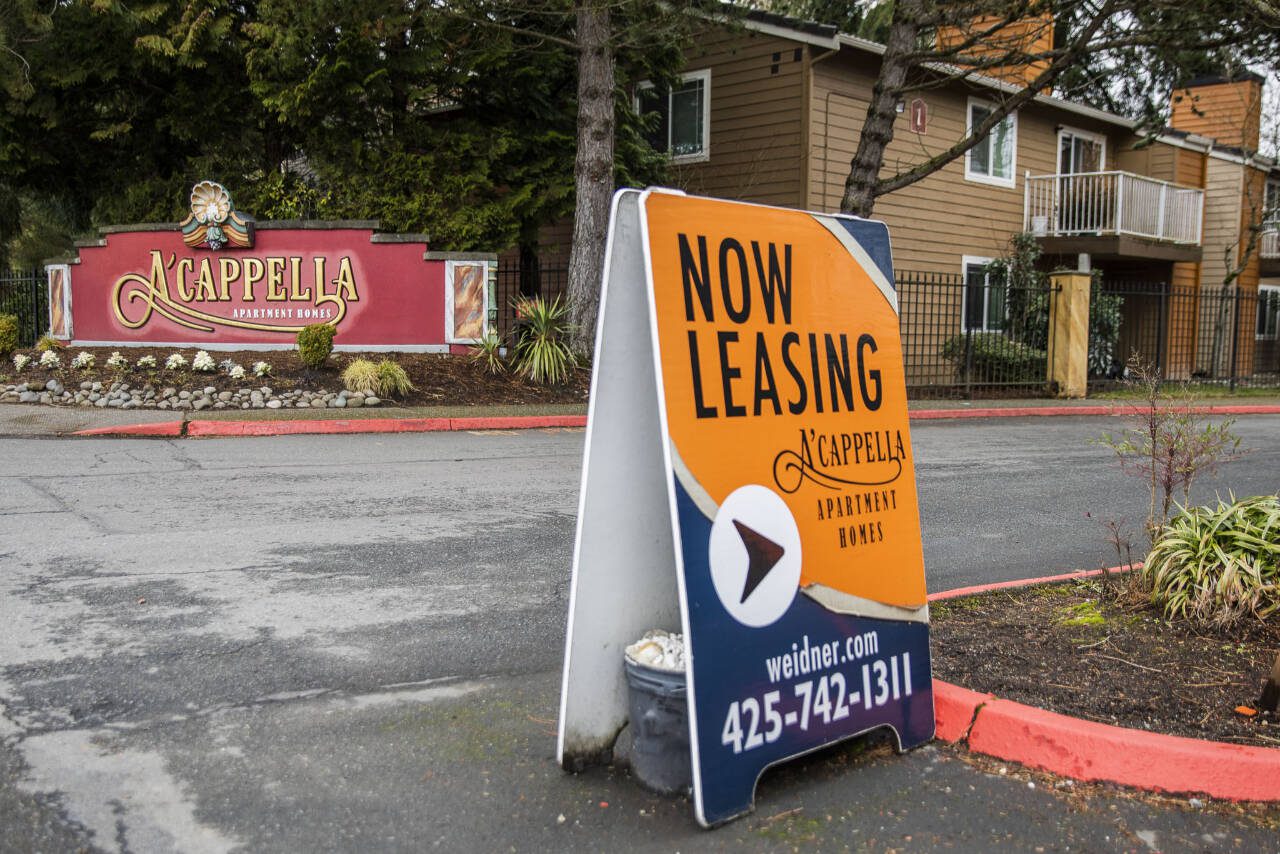 A for-lease sign is visible outside of A’cappella Apartments, in March, 2023, in Everett. (Olivia Vanni / The Herald file photo)