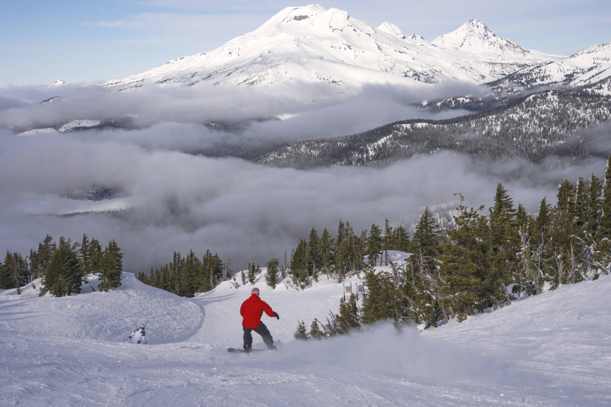 Skiers at Mt. Bachelor ski resort in Bend, Oregon, Jan. 12, 2025. Mt. Bachelor is one of the largest ski areas in North America. Powdr, the owner for 25 years, announced last summer that it was putting it up for sale. Locals saw a chance to get it back. (Ruth Fremson/The New York Times)