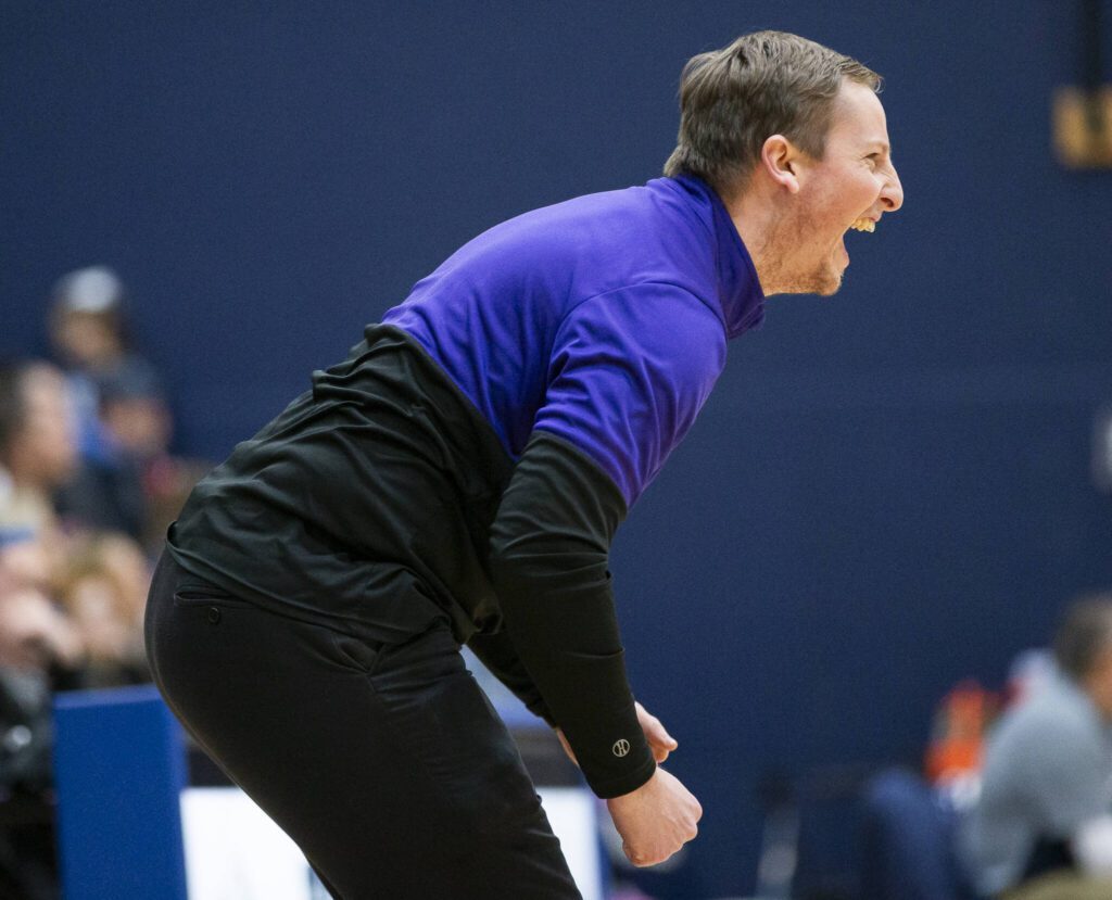 Lake Stevens head coach Seth Doge reacts to his team pull ahead during the game against Glacier Peak on Friday, Jan. 24, 2025 in Snohomish, Washington. (Olivia Vanni / The Herald)
