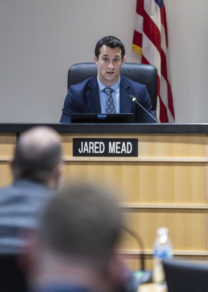Snohomish County Council member Jared Mead asks a question of George Skiles on Nov. 13, 2024, in Everett. (Olivia Vanni / The Herald)
