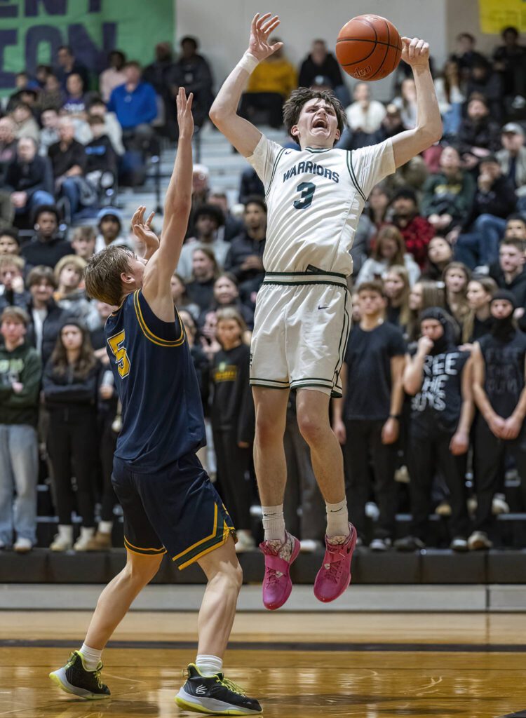 Edmonds-Woodway’s Grant Williams to getting fouled while attempting a 3-point shot during the game against Shorecrest on Tuesday, Jan. 28, 2025 in Edmonds, Washington. (Olivia Vanni / The Herald)

