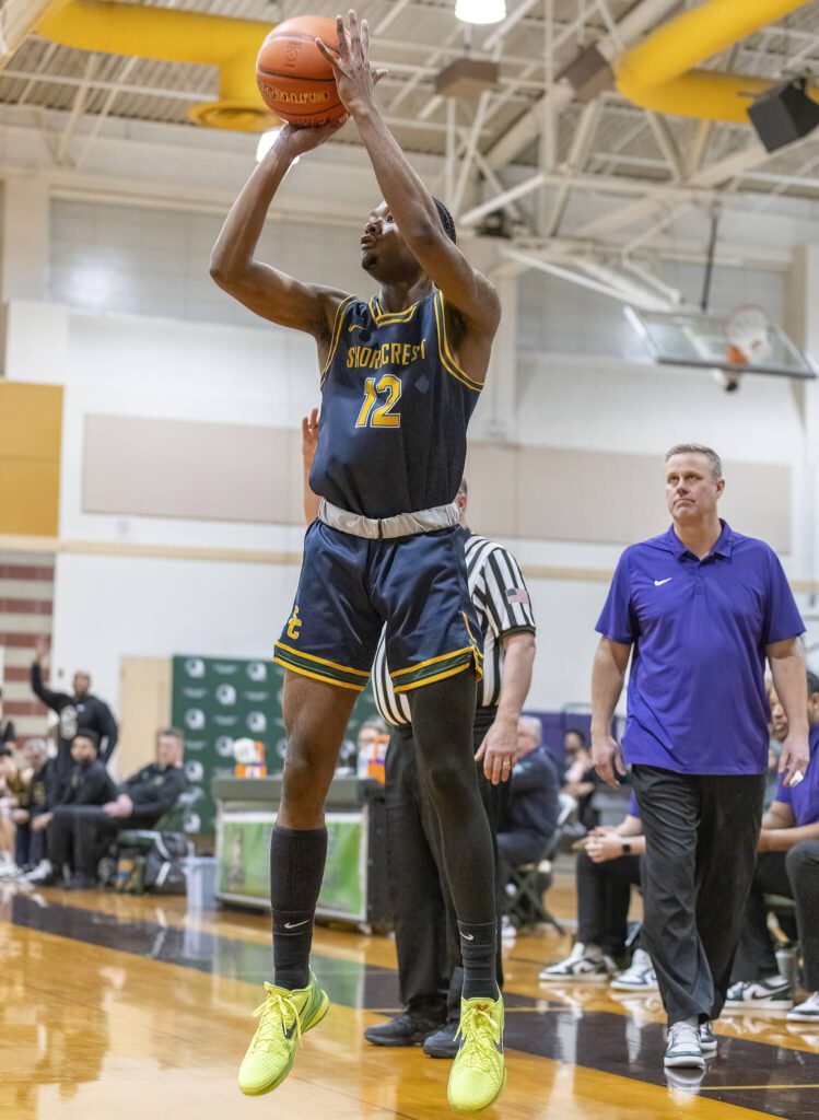 Shorecrest’s Junior Kagarabi makes a 3-point shot during the game against Edmonds-Woodway on Tuesday, Jan. 28, 2025 in Edmonds, Washington. (Olivia Vanni / The Herald)
