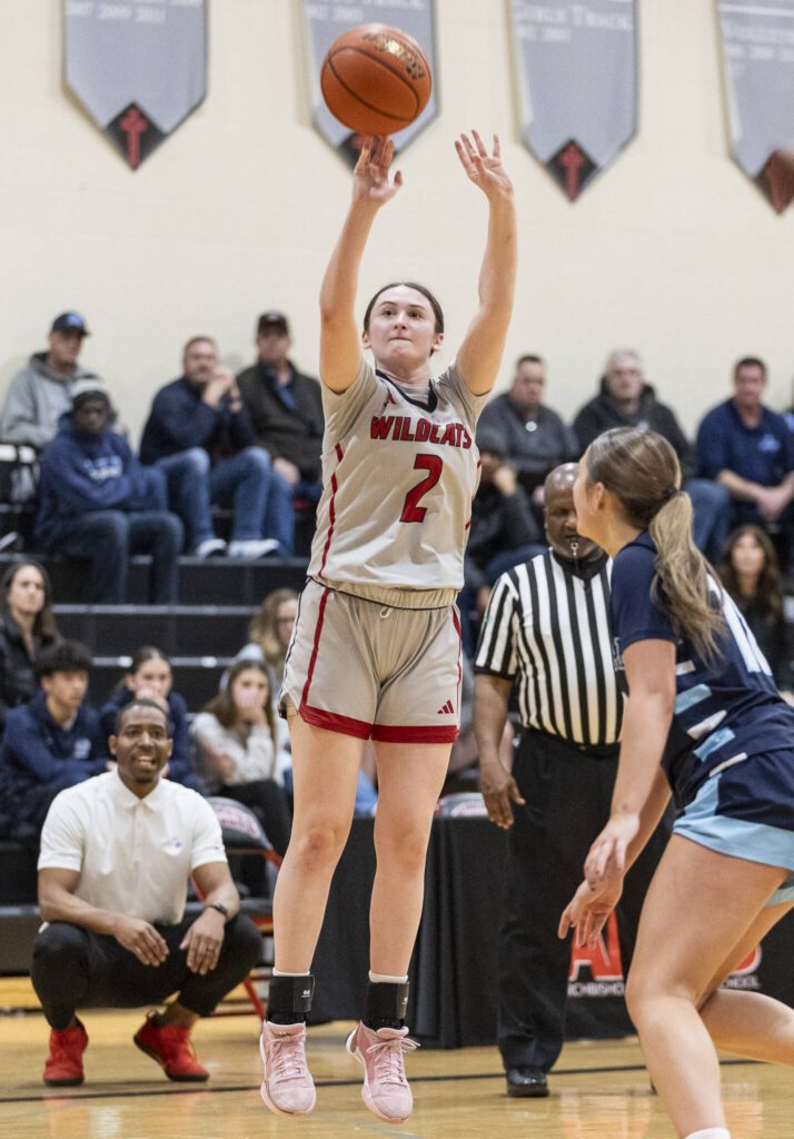 Archbishop Murphy’s Brooke Blachly makes a three point shot during the game against Meadowdale on Thursday, Jan. 30, 2025 in Everett, Washington. (Olivia Vanni / The Herald)

