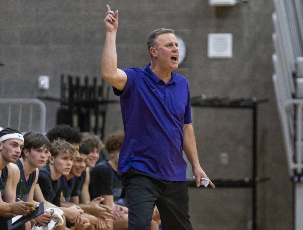 Edmonds-Woodway head coach Tyler Geving yells out instructions to his players during the game against Shorewood on Tuesday, Feb. 4, 2025 in Shoreline, Washington. (Olivia Vanni / The Herald)
