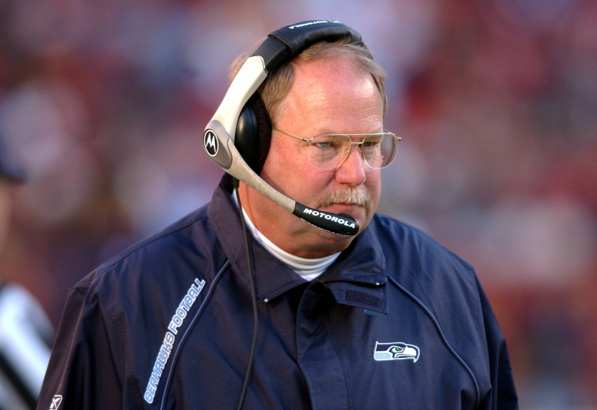 Seattle head coach Mike Holmgren watches his team against Washington Sunday, November 9, 2003. (George Bridges / KRT / Tribune News Services)