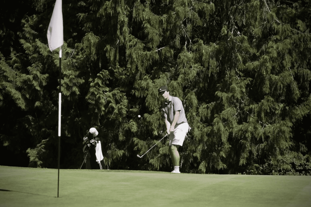 Palmer Mutcheson chips onto the green during the Men’s Club Championship at Snohomish Golf Course. Mutcheson won the tournament and carded a nine-under-par 63 on Aug. 4, 2024, which set a new course record. (Photo courtesy Kiana Richards, Snohomish Golf Course)