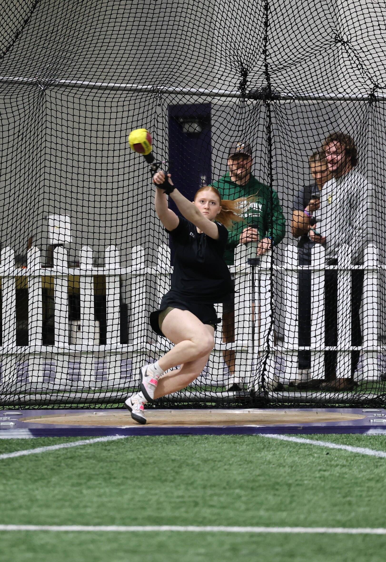 Kimberly Beard, a Mukilteo resident who attends King’s High School, prepares to release a throw during the 20-pound weight competition at George Fox University in Newberg, Ore. on Saturday, Feb. 8, 2025. (Photo courtesy of Donna Beard)