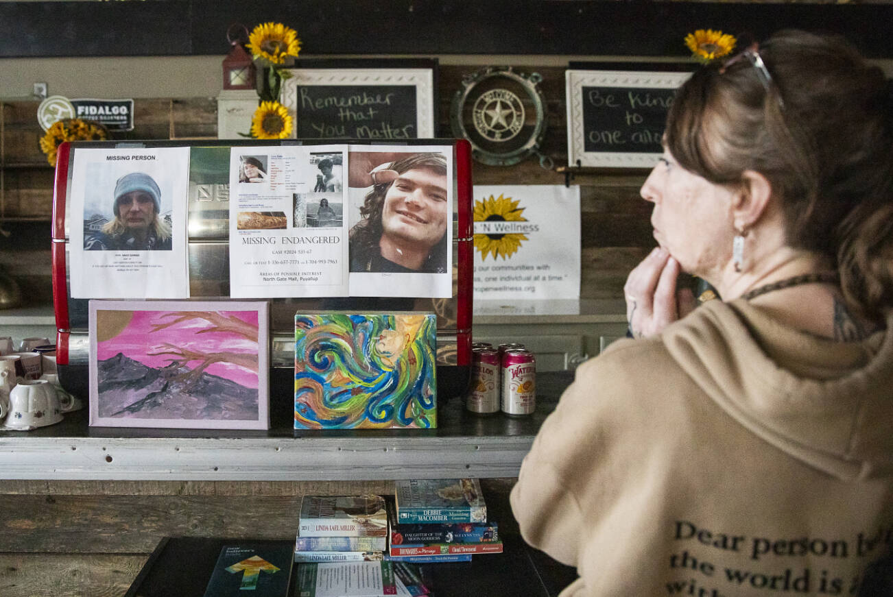 Jasmine Donahue talks about being a place for people leave messages when looking for family members, friends or loved ones on the street on Thursday, Jan. 9, 2025 in Everett, Washington. (Olivia Vanni / The Herald)