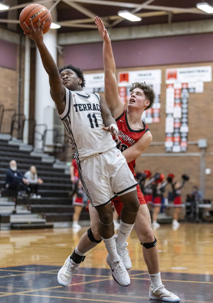 Mountlake Terrace’s Rayshaun Connor makes a layup during the 3A district loser-out playoff game against Snohomish on Thursday, Feb. 13, 2025 in Mountlake Terrace, Washington. (Olivia Vanni / The Herald)
