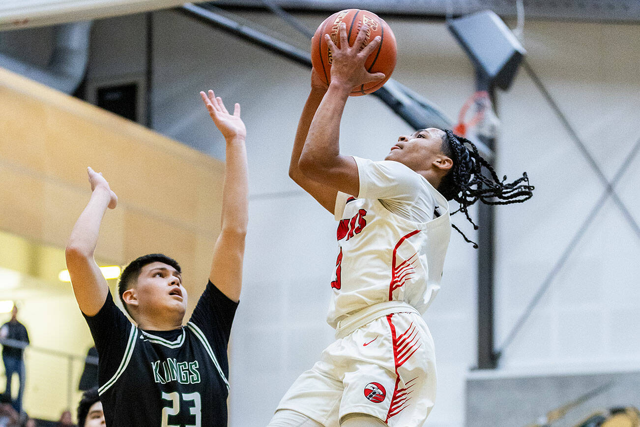 Tulalip Heritage’s JJ Gray makes a layup during the winner-to-state playoff game against Muckleshoot Tribal School on Tuesday, Feb. 18, 2025 in Marysville, Washington. (Olivia Vanni / The Herald)