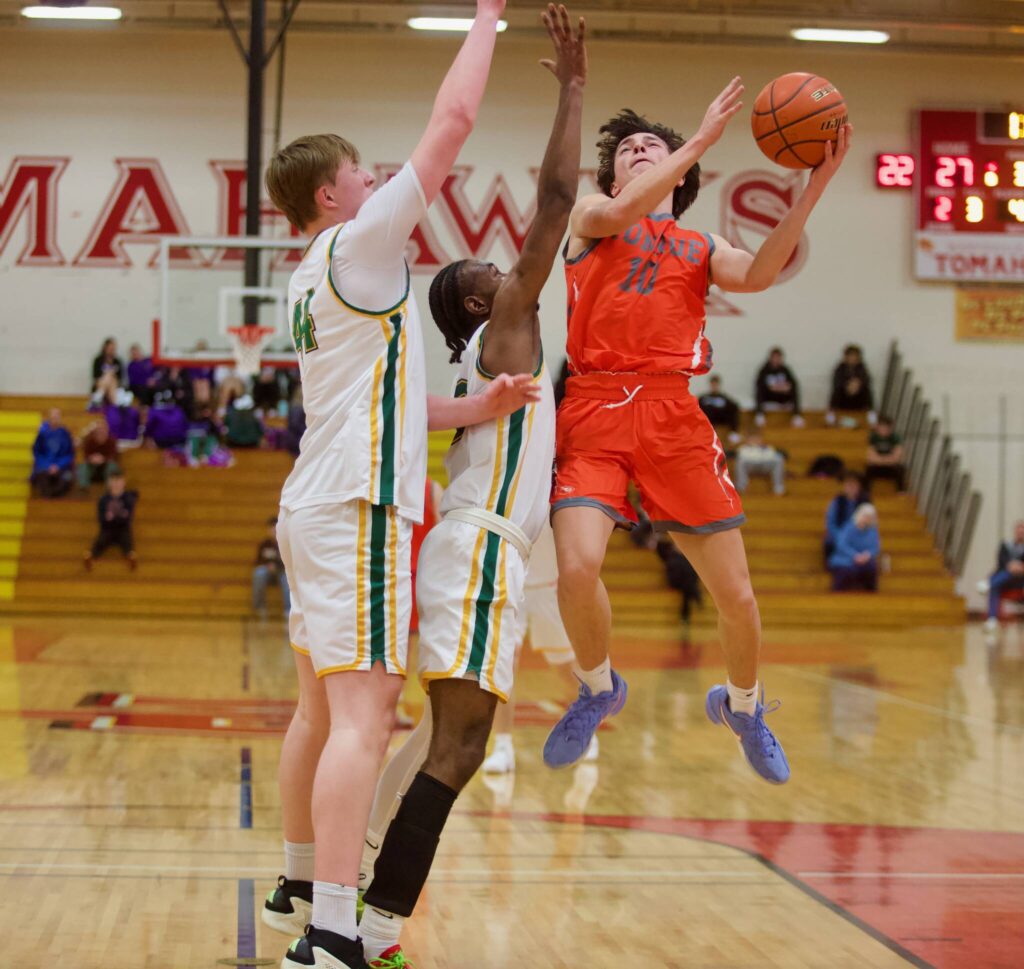 Monroe senior Dylan Hall (10) elevates for a layup against Shorecrest in the District 1 Boys 3A Basketball Semifinals in Marysville, Washington on Feb. 19, 2025. (Joe Pohoryles / The Herald)
