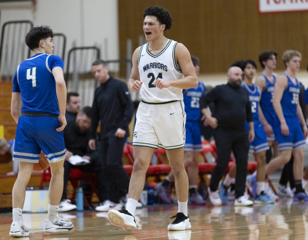 Edmonds-Woodway’s Julian Gray yells after Shorewood calls a timeout during the 3A district semifinal game on Wednesday, Feb. 19, 2025 in Marysville, Washington. (Olivia Vanni / The Herald)
