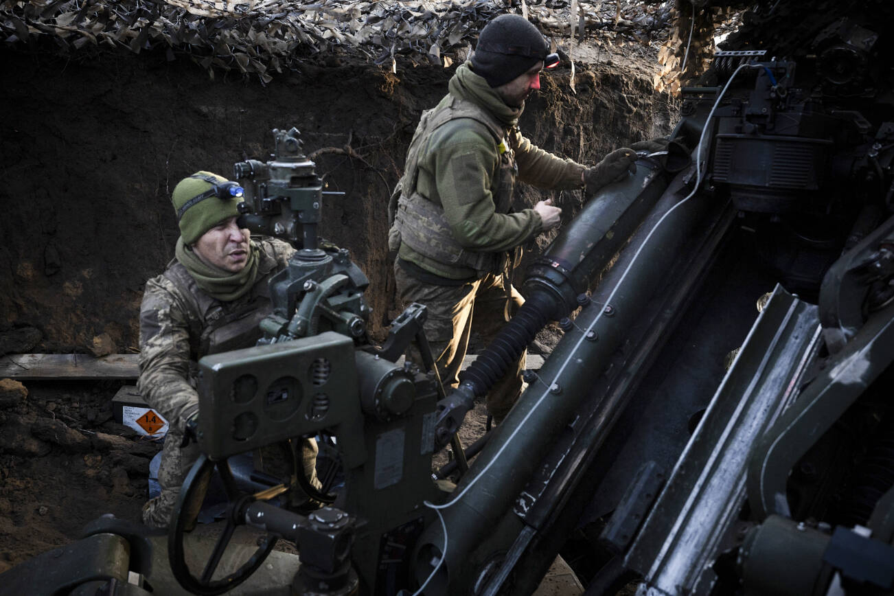 Ukrainian soldiers fire artillery at Russian targets from the front line near Kurakove, Ukraine, Feb. 14, 2025. In comments that stunned America’s allies in Europe and angered Ukraine’s government, President Trump on Tuesday appeared to blame Ukraine’s leaders for Russia’s invasion. (Tyler Hicks/The New York Times)